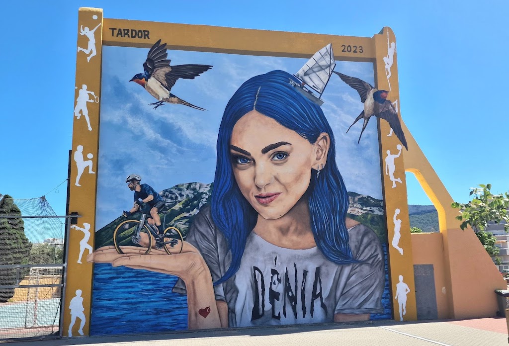 Large format mural in Dénia's municipal sports center.