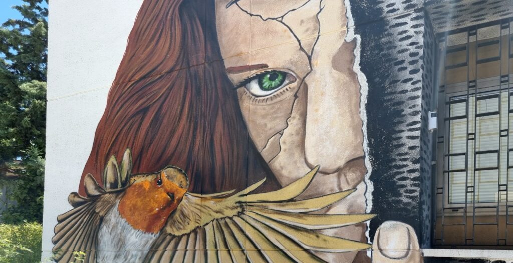 Texture and color detail in urban mural EST Art Space Madrid facade by Tardor.